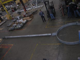 Large custom sway strut with custom clamp